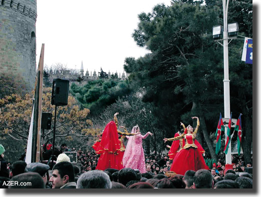 Outdoor performance in Baku of traditional dances next to the citadel walls of the Inner city.  Pirouz Khanlou