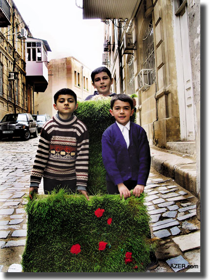 Children in Baku's "Inner City" helping to set up Novruz exhibitions made of "samani". Mehdi Mammadov