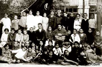  Young Chingiz Mustafayev is seated on the bench on the second row, third from the left. He was eight years old, 1931. Photo: Courtesy the family of Chingiz Mustafayev.  