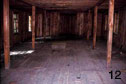 The barracks held two layers of plank beds which could accommodate 120 prisoners