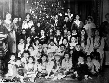 The author of the novel "Ali & Nino" is still under dispute. But many identify the pen name Kurban Said [Gurban Sayid] with Leo Nussimbaum. He is the boy in the third row with the large ears here as a guest at a Christmas party in 1908 at the home of the Ashurbeyli Family. Their daughter Sara is center on the first row. Courtesy of Oil Baron Ashurbeyov family.
